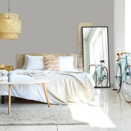 Interior,Of,Light,Bedroom,With,Bicycle,And,Mirror